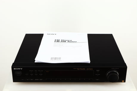 Top of a used Sony ST-S570ES FM/AM Tuner in a black finish showing Manual