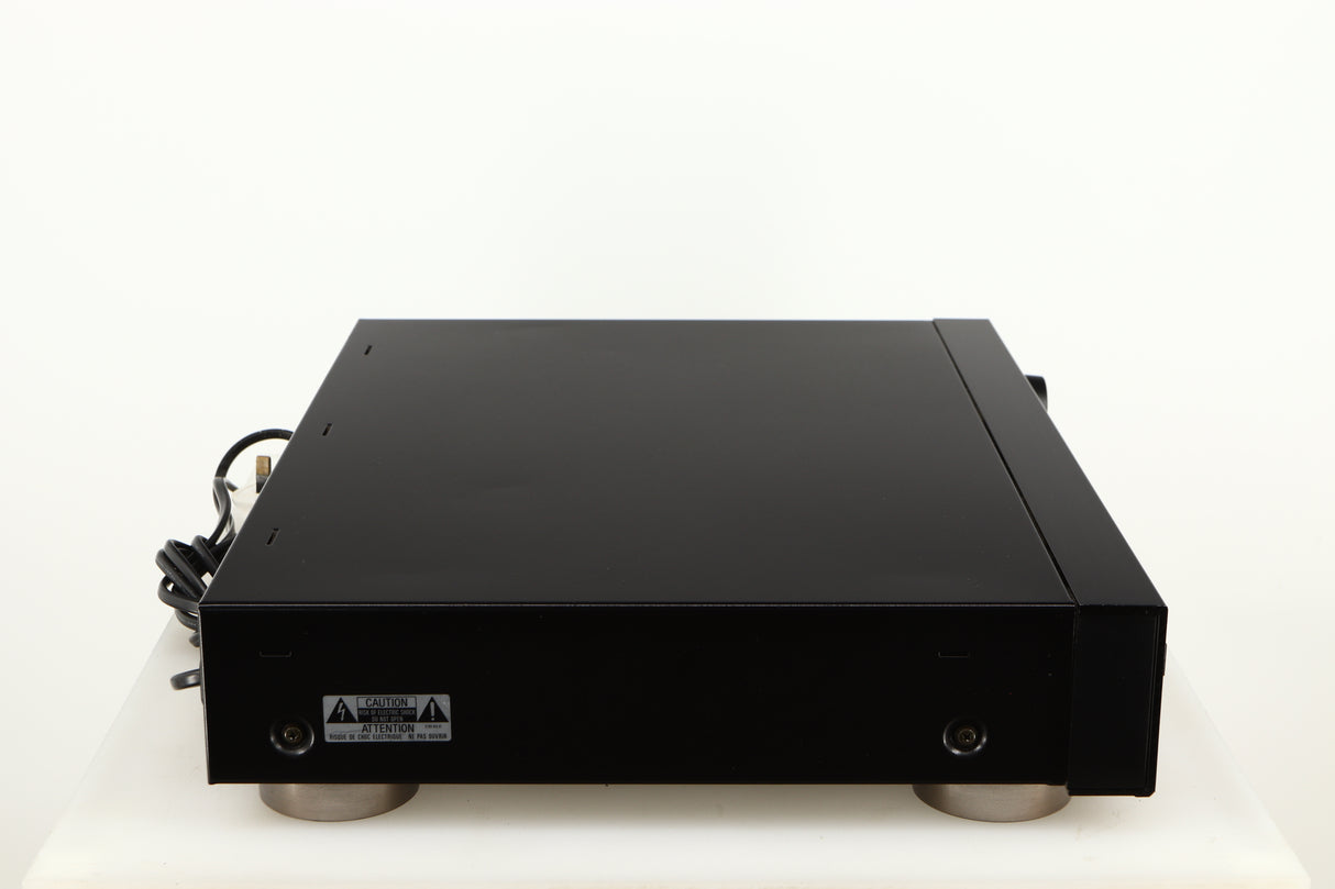 Left side view of a used Sony ST-S570ES FM/AM Tuner in a black finish