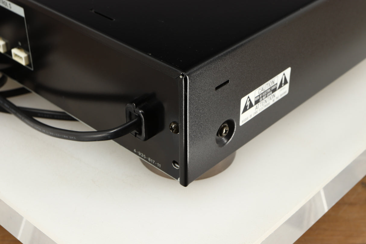Rear left corner of a used Sony ST-S570ES FM/AM Tuner in a black finish