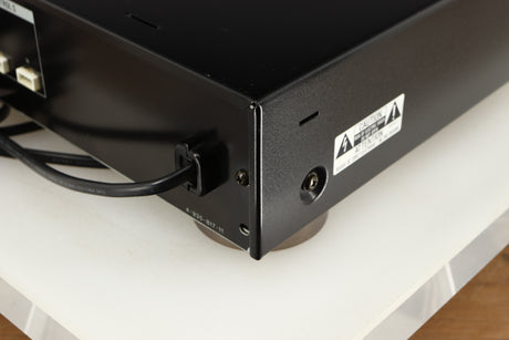 Rear left corner of a used Sony ST-S570ES FM/AM Tuner in a black finish