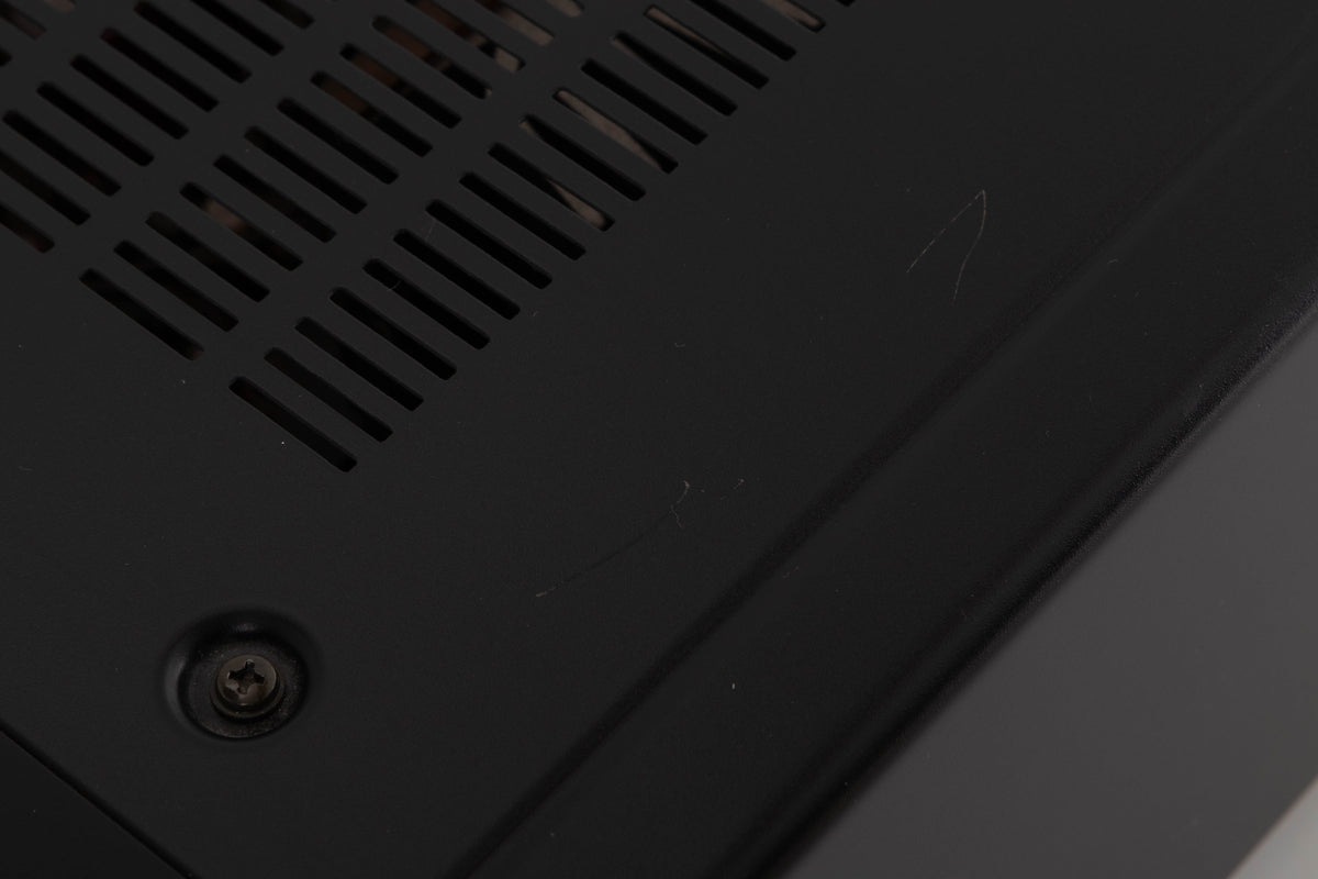 Close up of a used Sony TA-FA30ES Integrated Amplifier in a Black finish showing scratches on top