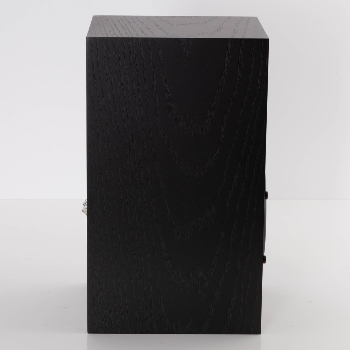 Left side view of a used Spendor A1.2 Standmount Speaker in a Black Oak finish