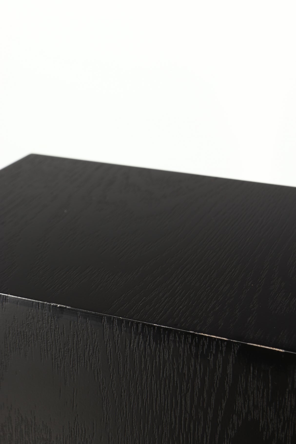 Close up of a used Spendor D9.2 Floorstanding Speaker in a black oak finish showing some damage on left side edge