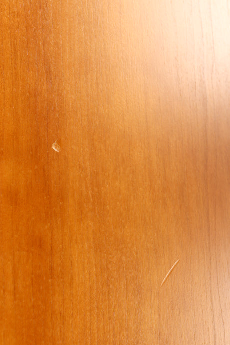Close up of a used Spendor S8e Floorstanding Speaker in a cherry finish showing few nicks on left side