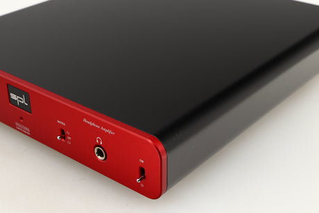 Front right corner of a used SPL Phonitor SE Headphone Amplifier in a red finish