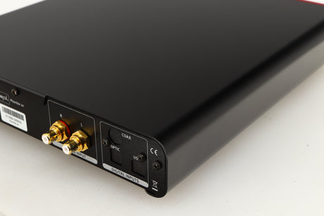 Rear left corner of a used SPL Phonitor SE Headphone Amplifier in a red finish