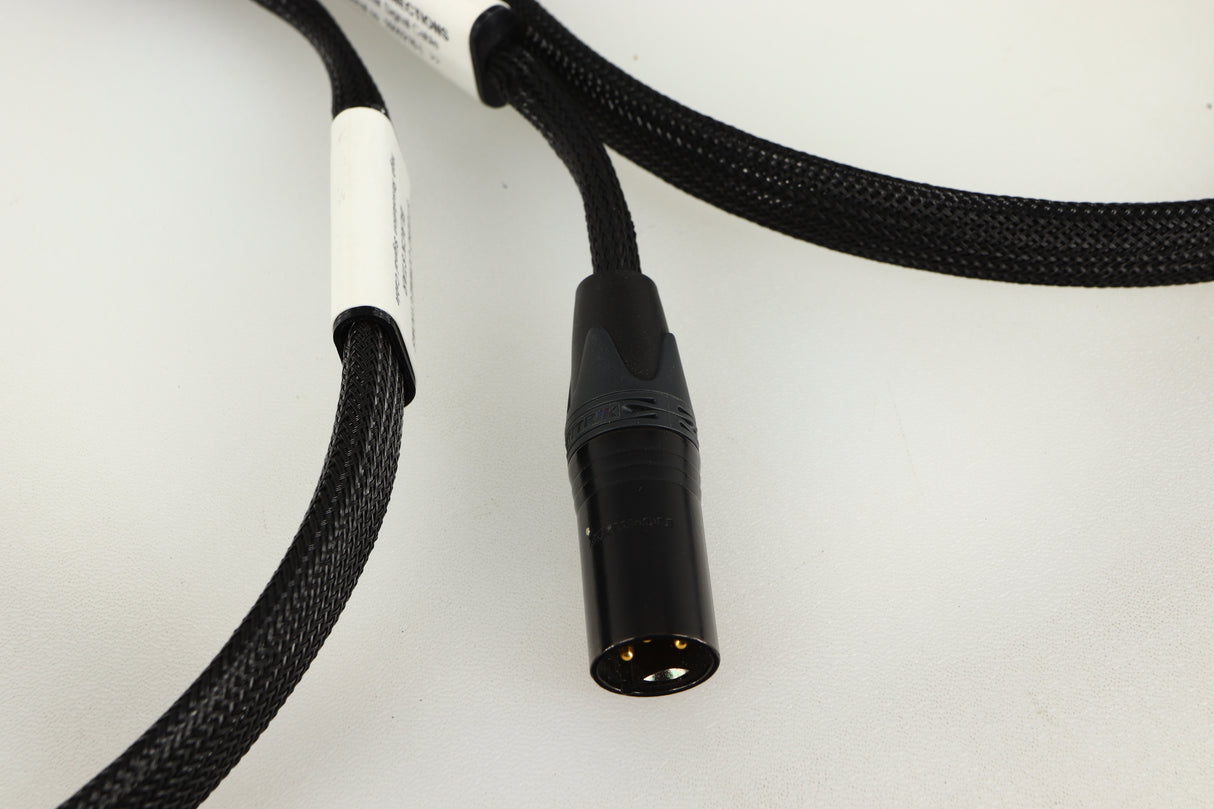 Close up of used Studio Connections Black Star XLR-XLR Interconnect Cables 1.0m Pair in a black finish showing connector