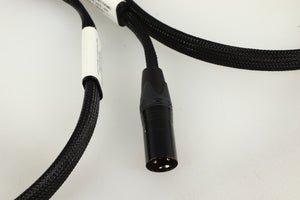 Close up of used Studio Connections Black Star XLR-XLR Interconnect Cables 1.0m Pair in a black finish showing connector