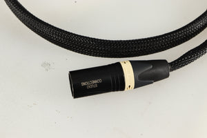 Close up of used Studio Connections Black Star XLR-XLR Interconnect Cables 1.0m Pair in a black finish showing connector