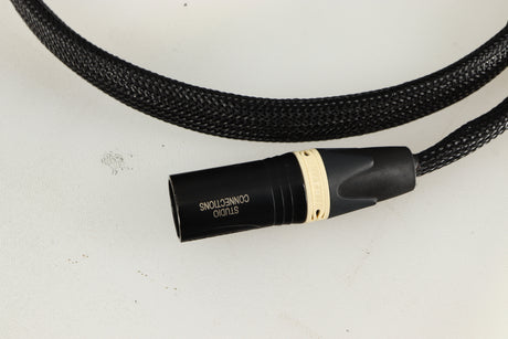 Close up of used Studio Connections Black Star XLR-XLR Interconnect Cables 1.0m Pair in a black finish showing connector