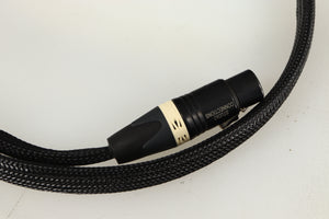 Close up of used Studio Connections Black Star XLR-XLR Interconnect Cables 1.0m Pair in a black finish showing connector