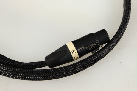 Close up of used Studio Connections Black Star XLR-XLR Interconnect Cables 1.0m Pair in a black finish showing connector