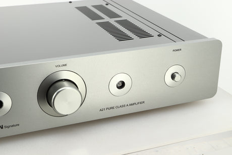 Close up view of a used Sugden A21 I-S Integrated Amplifier in Titanium finish showing the right side of the fascia