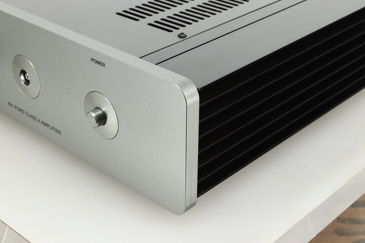 Front right corner view of a used Sugden A21 I-S Integrated Amplifier in Titanium finish 