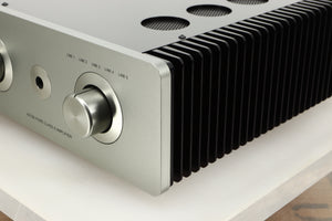 Front right corner view of a used Sugden A21 SE Signature Integrated Amplifier in Titanium finish