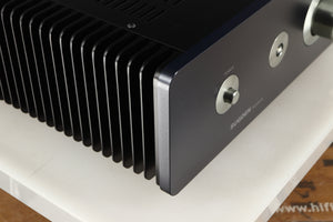Front left corner of a used Sugden A21SE Signature Integrated Amplifier in a graphite finish