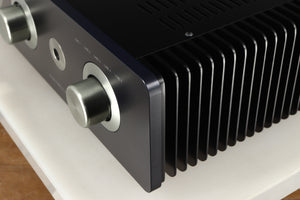 Front right corner of a used Sugden A21SE Signature Integrated Amplifier in a graphite finish