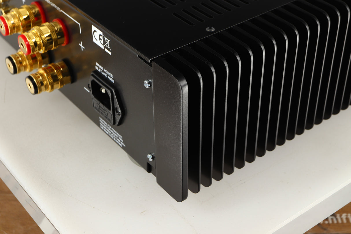 Rear left corner of a used Sugden A21SE Signature Integrated Amplifier in a graphite finish