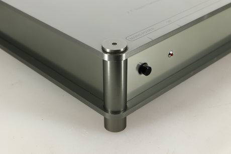 Front left corner of a used Sugden Bijou Ampmaster Power Amplifier in a silver finish