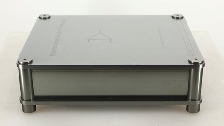 Left side view of a used Sugden Bijou Ampmaster Power Amplifier in a silver finish