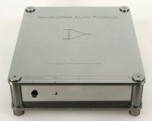 Top of a used Sugden Bijou Ampmaster Power Amplifier in a silver finish