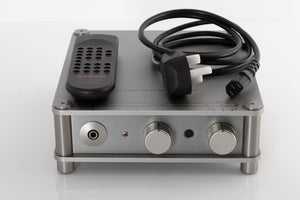 Front view of a used Sugden Headmaster Class A Headphone / Pre Amplifier with mains cable, and remote 