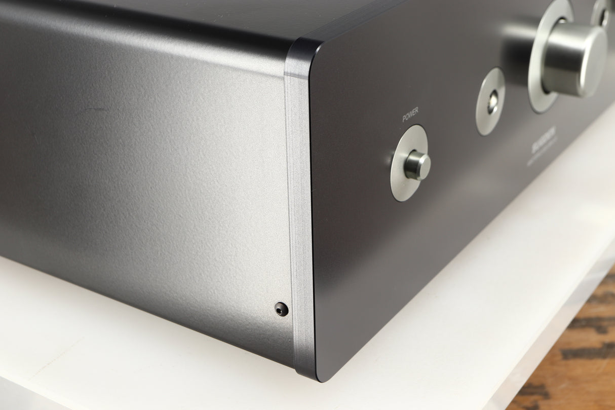 Front left corner of a used Sugden Masterclass ANV-50 Integrated Amplifier in a graphite finish