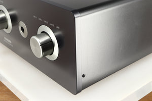 Front right corner of a used Sugden Masterclass ANV-50 Integrated Amplifier in a graphite finish