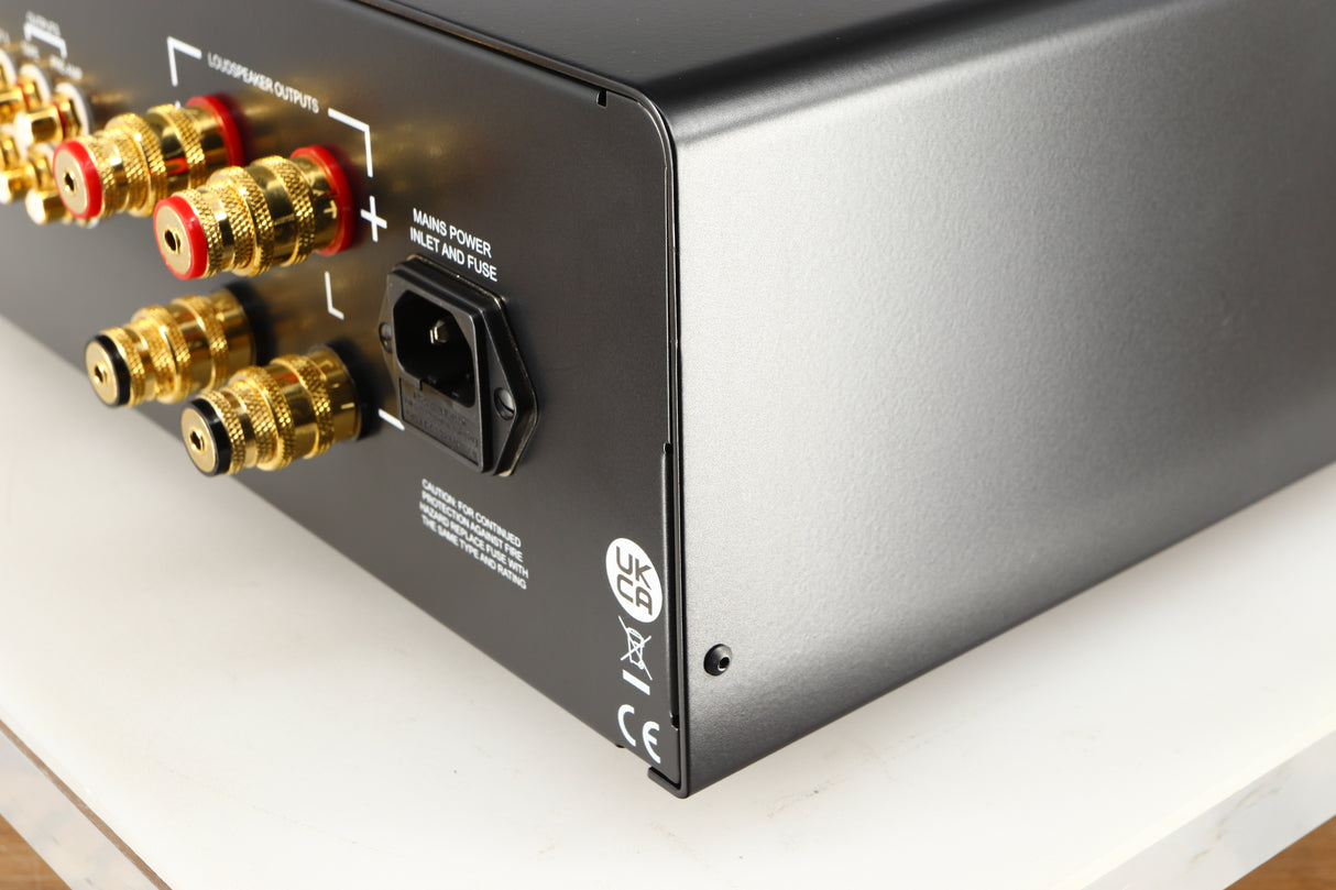 Rear left corner of a used Sugden Masterclass ANV-50 Integrated Amplifier in a graphite finish