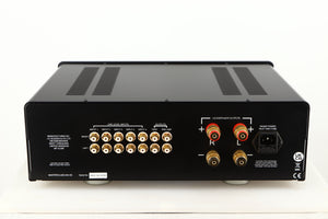 Rear view of a used Sugden Masterclass ANV-50 Integrated Amplifier in a graphite finish showing Loudspeaker Outputs, Phono Inputs, Phono Outputs and Mains Input
