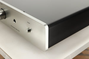 Front right corner view of a used Sugden Mystro Integrated Amplifier in Titanium finish