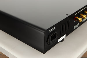 Rear left corner view of a used Sugden Mystro Integrated Amplifier in Titanium finish