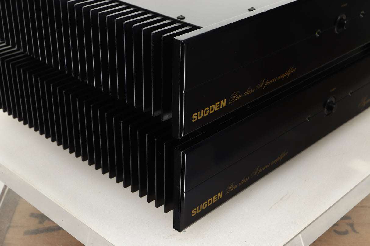 Front left corner view of a used pair of Sugden Symetra Monoblock Power Amplifiers