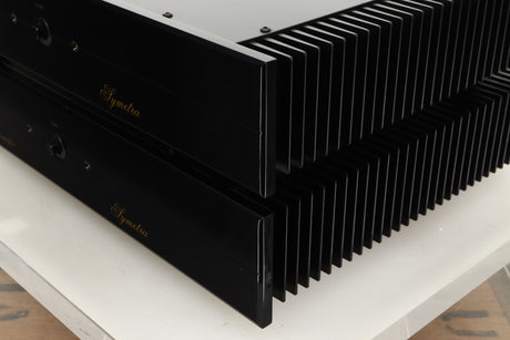 Front right corner view of a used pair of Sugden Symetra Monoblock Power Amplifiers