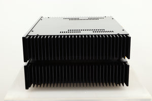 Side view of a used pair of Sugden Symetra Monoblock Power Amplifiers