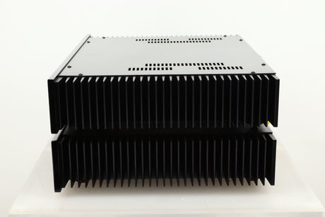 Side view of a used pair of Sugden Symetra Monoblock Power Amplifiers