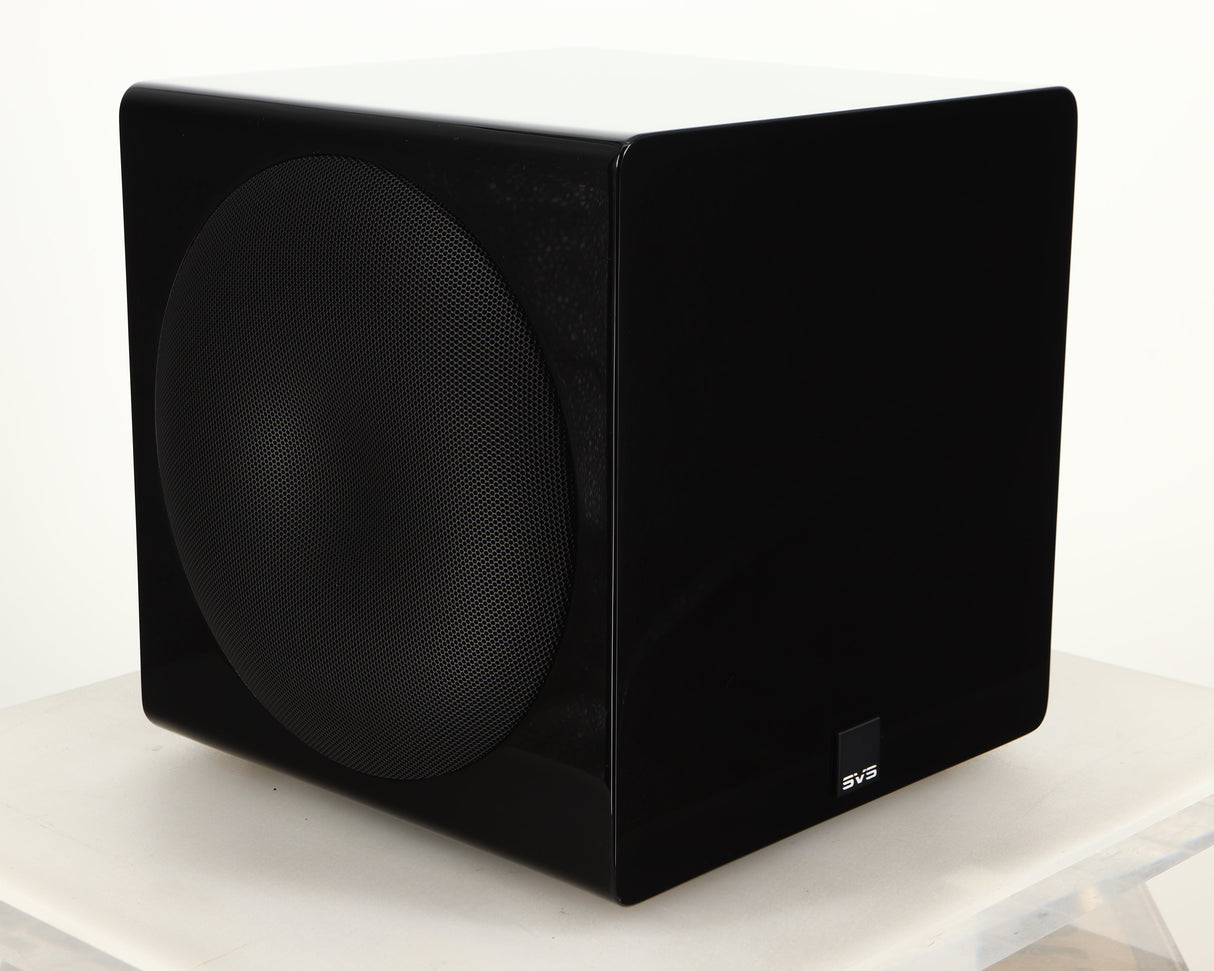Front left corner of a used SVS-3000 Micro Subwoofer W/ Wireless Kit in a piano black finish