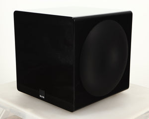 Front right corner of a used SVS-3000 Micro Subwoofer W/ Wireless Kit in a piano black finish