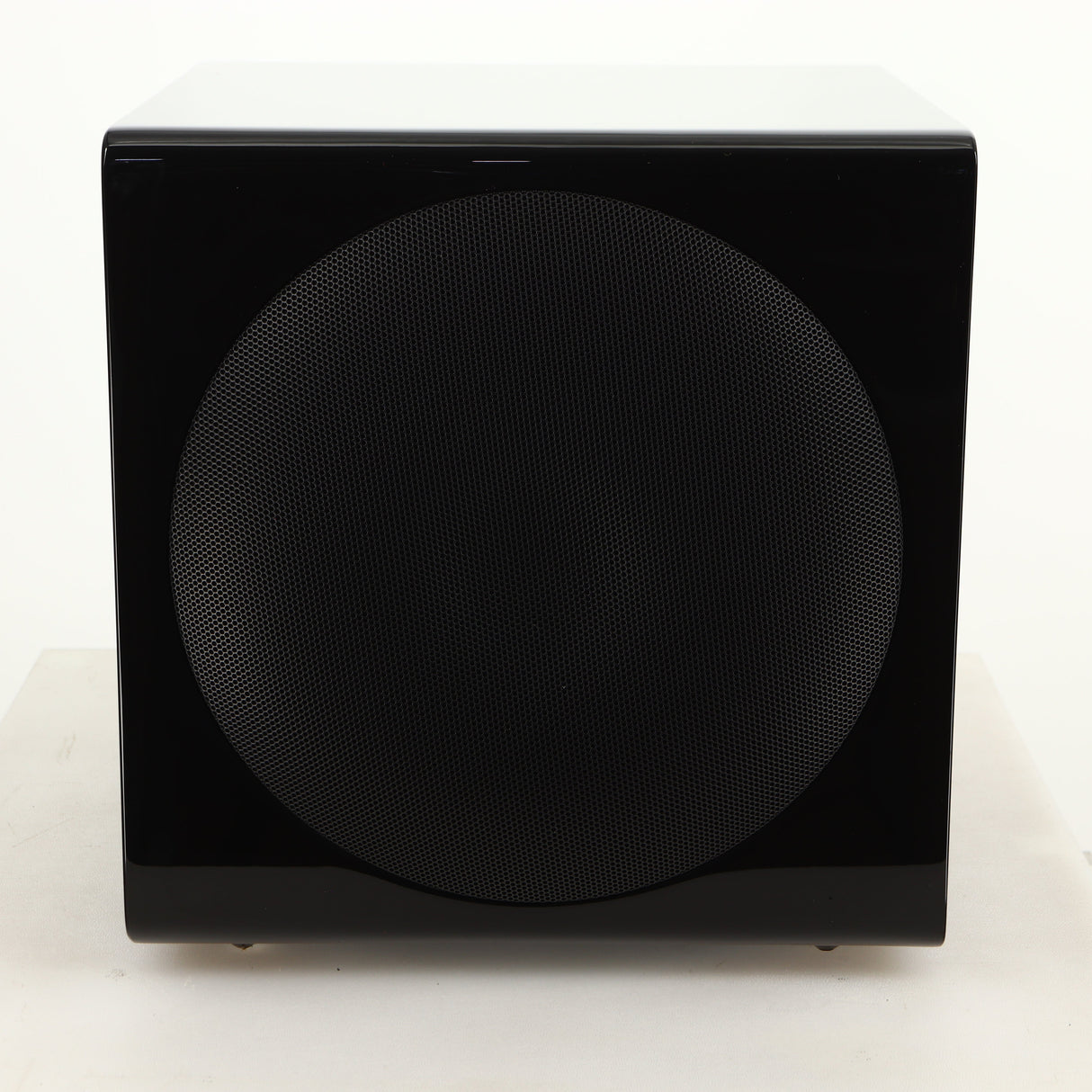 Left side view of a used SVS-3000 Micro Subwoofer W/ Wireless Kit in a piano black finish