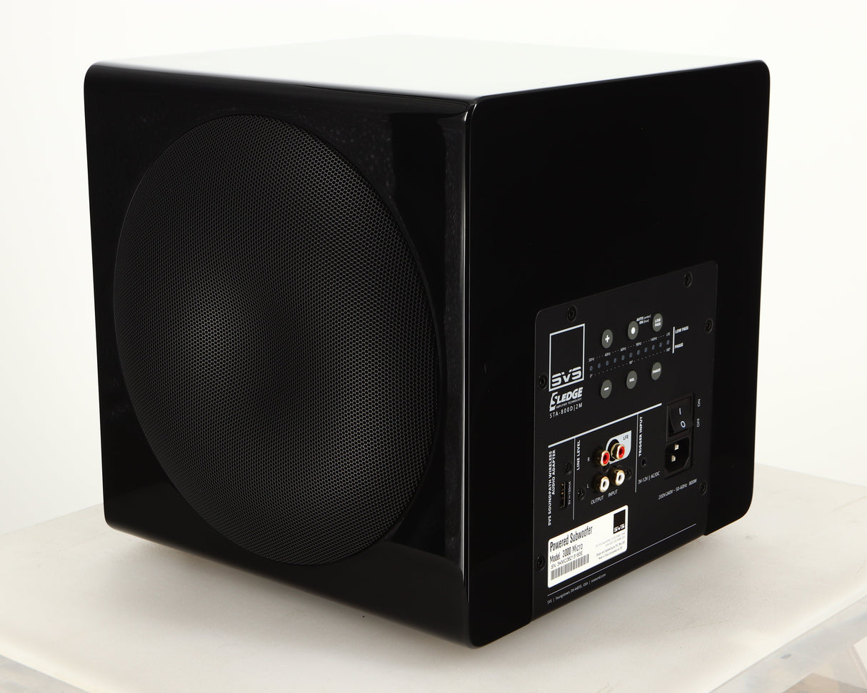 Rear right corner of a used SVS-3000 Micro Subwoofer W/ Wireless Kit in a piano black finish