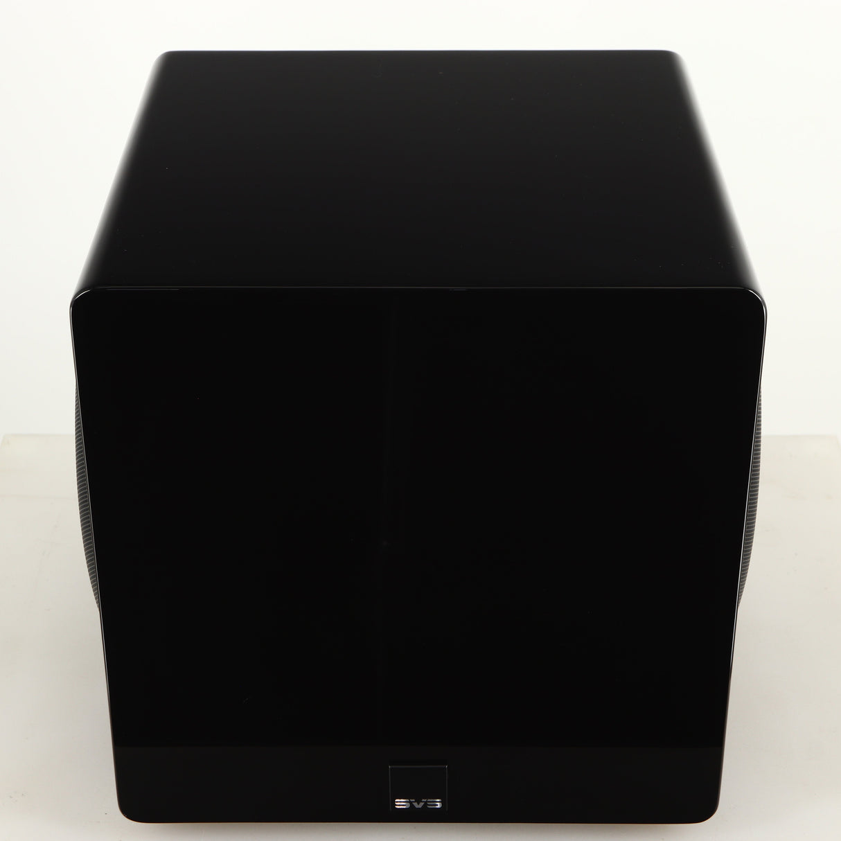 Top of a used SVS-3000 Micro Subwoofer W/ Wireless Kit in a piano black finish