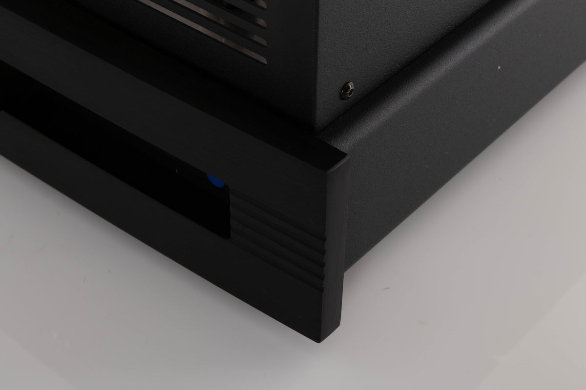 Front right corner of a used Synthesis Roma 753AC Valve Integrated Amplifier in a Black finish