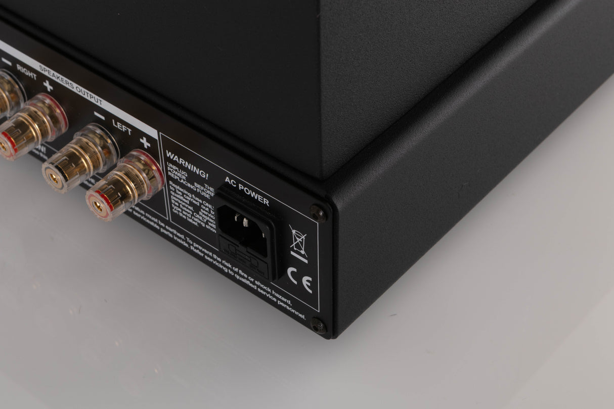 Rear left corner of a used Synthesis Roma 753AC Valve Integrated Amplifier in a Black finish