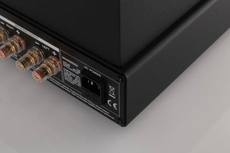 Rear left corner of a used Synthesis Roma 753AC Valve Integrated Amplifier in a Black finish