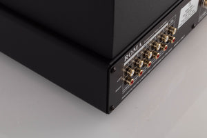 Rear right corner of a used Synthesis Roma 753AC Valve Integrated Amplifier in a Black finish