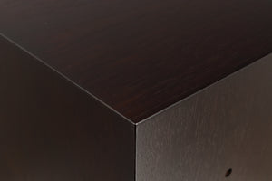 Close up of a used Tannoy Revolution DC6SE Standmount Speaker in an espresso finish showing scratching on top