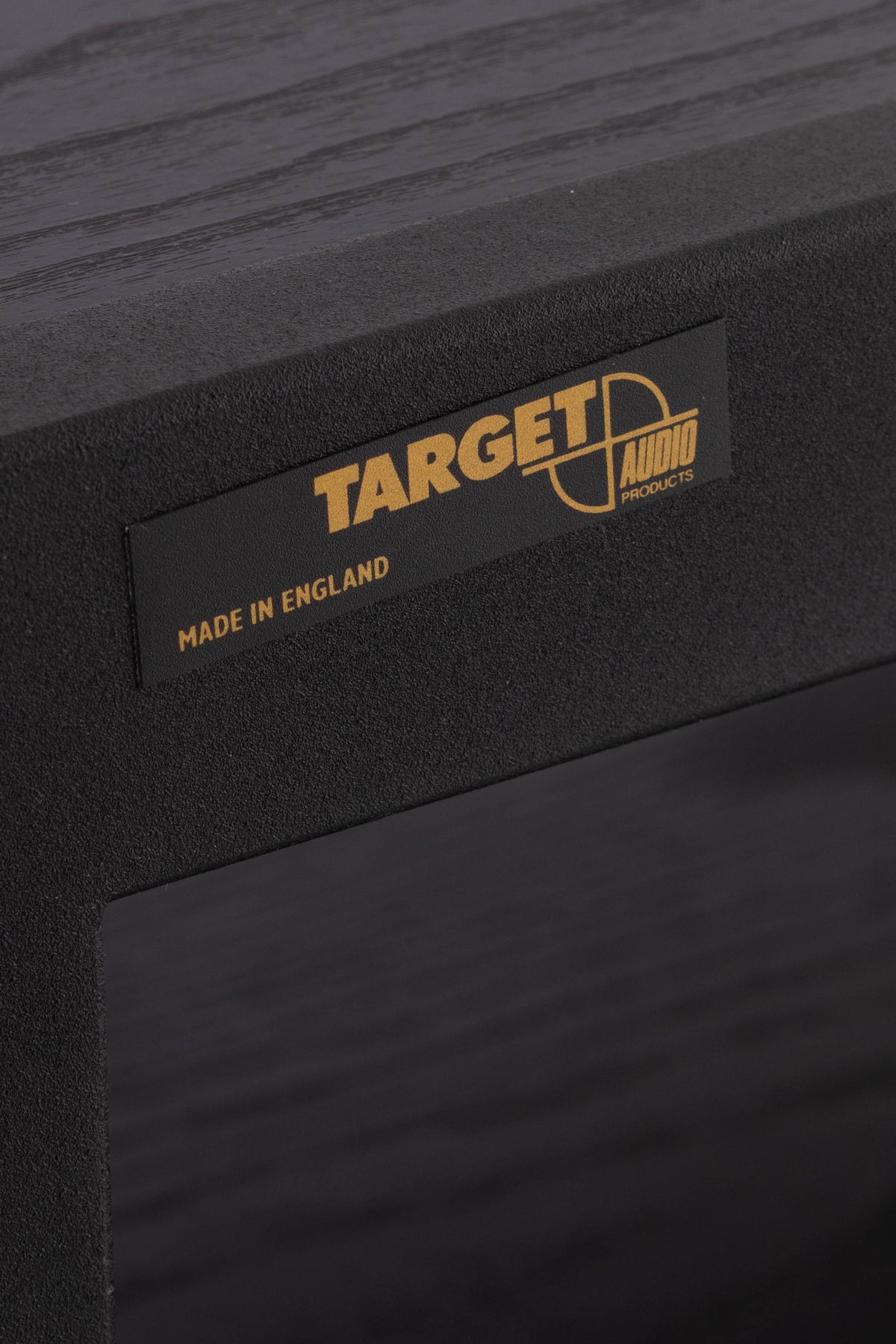 Close up of a used Target 3 Shelf Hifi Stand W/ Castors in a Black finish showing logo
