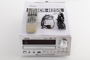 Front view of a used TEAC CR-H255 CD Receiver in Silver with manual, remote, and 2x aerials