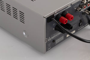 Reear left corner view of a used TEAC CR-H255 CD Receiver in Silver