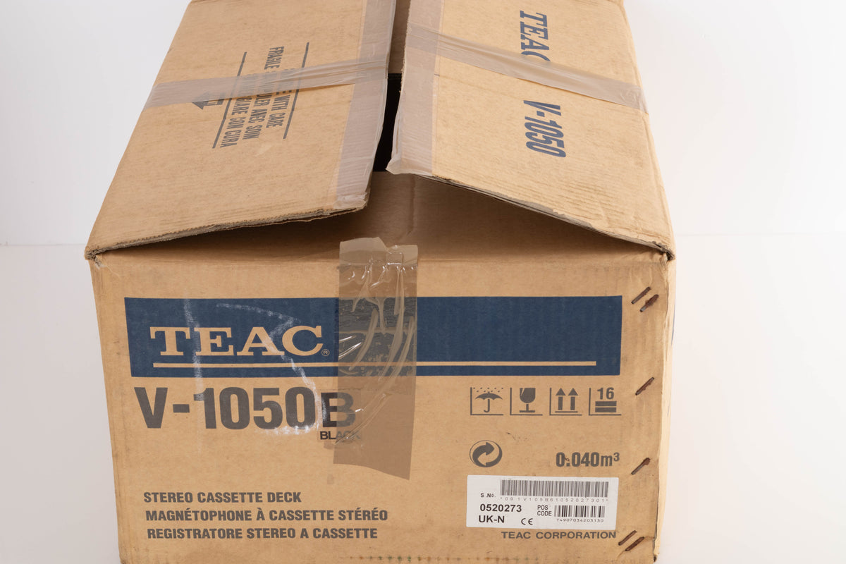 Box for a used TEAC V-1050 Cassette Deck in a Black finish